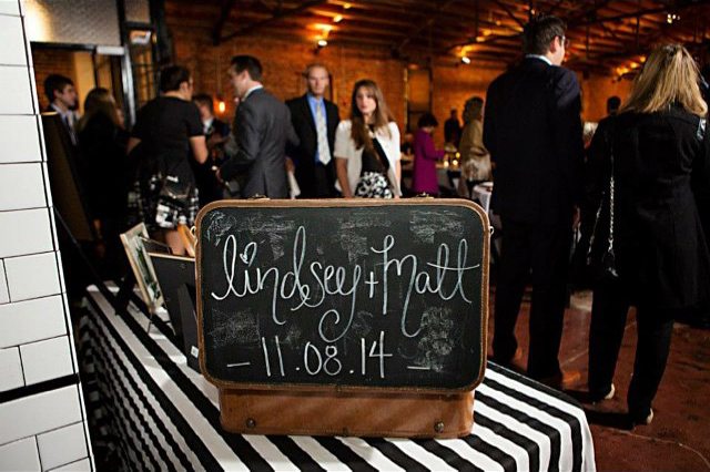 black and white stripe tablecloth chalkboard sign