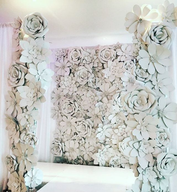 white flower wall backdrop fashion show runway