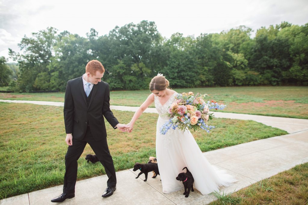 wedding puppies, couple with puppies, including you pet at your wedding